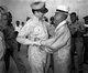 Korea: General Douglas MacArthur, Supreme Commander for Allied Powers, (Left) and Dr. Syngman Rhee, Korea's first President, greet one another upon the General's arrival at Kimpo (Gimpo) Air Force Base, c. 1948